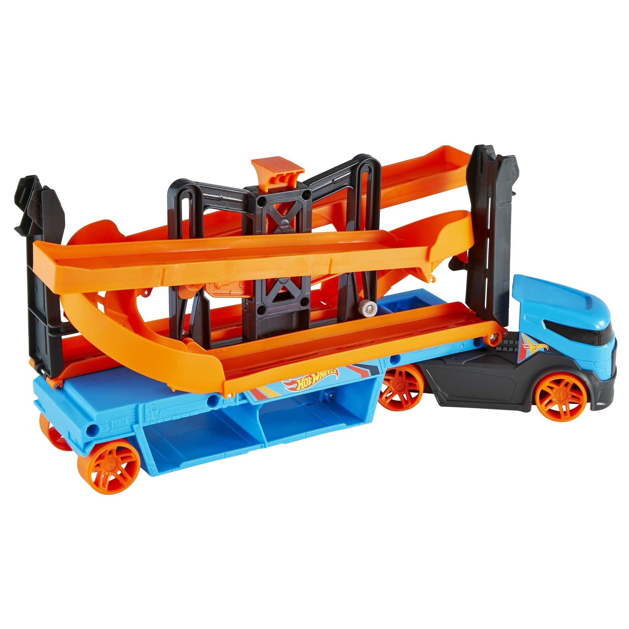 Hot wheels - trasportatore solleva e lancia, veicolo con ruote funzionanti e 10 macchinine die-cast incluse , contiene fino a 20 veicoli - Hot Wheels