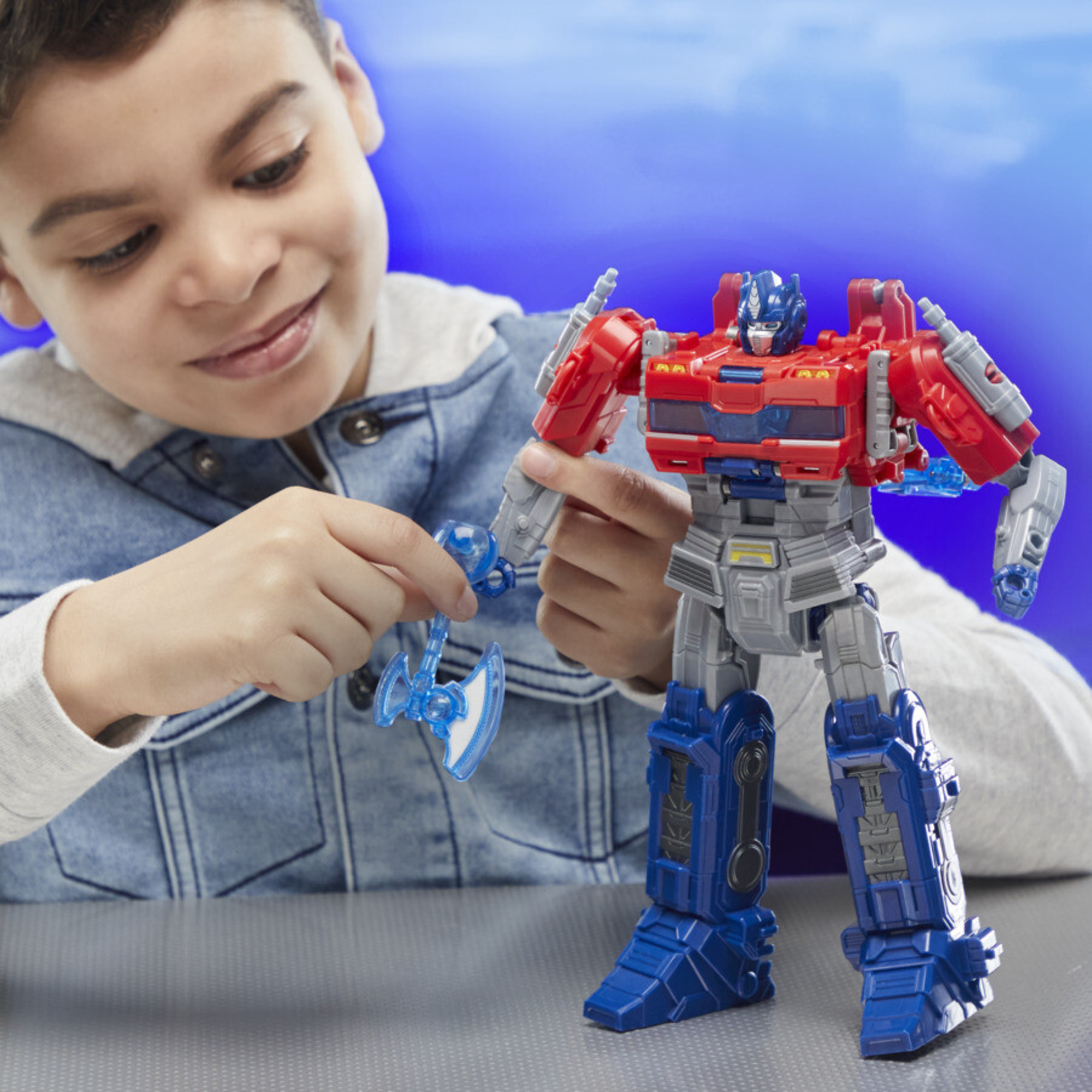 Transformers one - power flip optimus prime (orion pax), action figure interattiva - Transformers